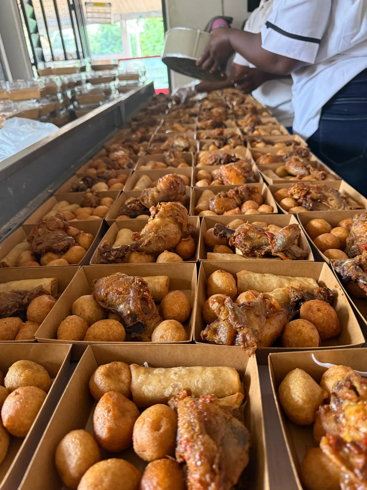 Bulk order of small chops in branded boxes ready for delivery