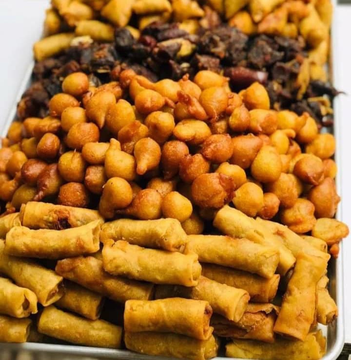 Colorful mixed small chops platter with variety of appetizers